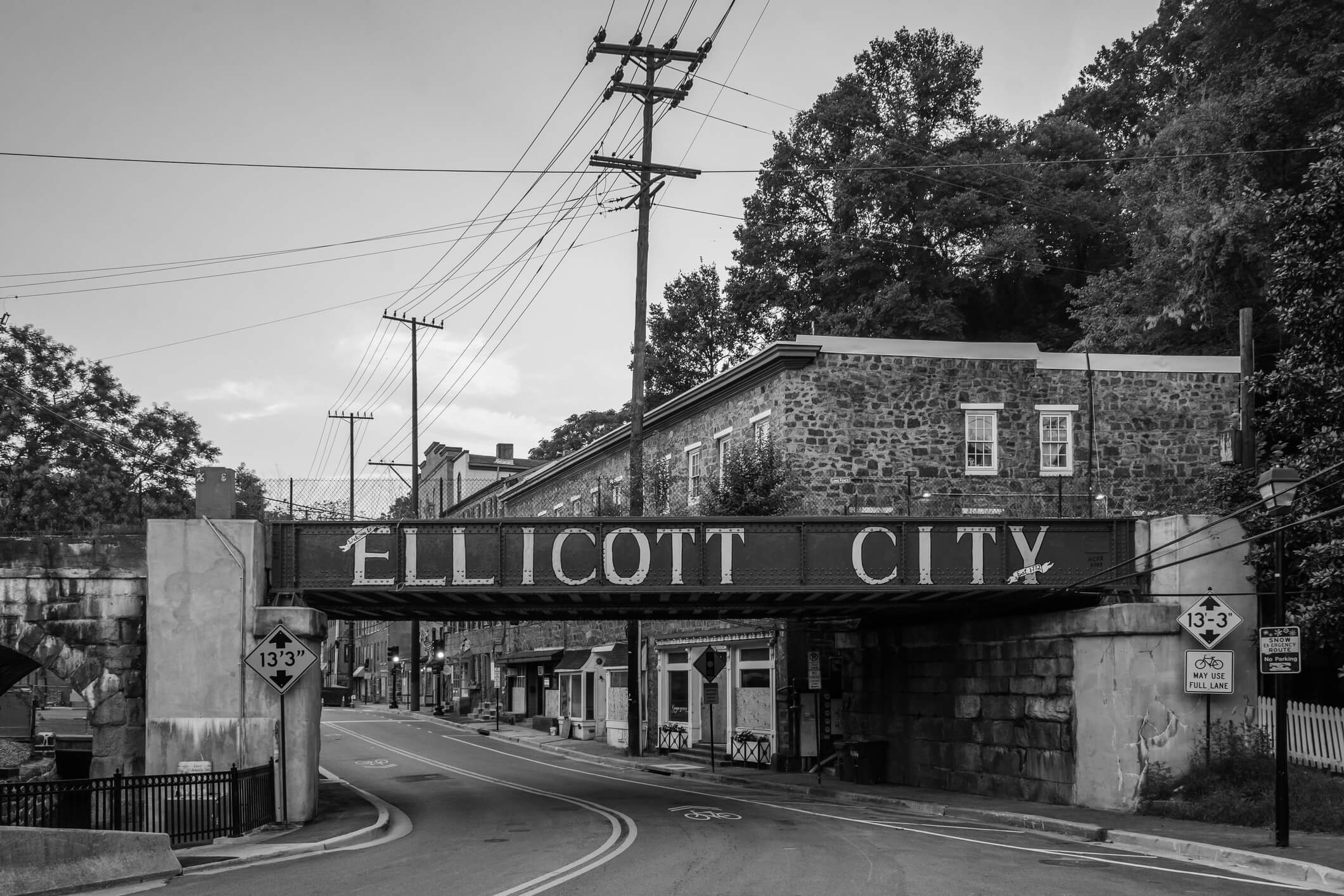 black and white photo of ellicott city bridge